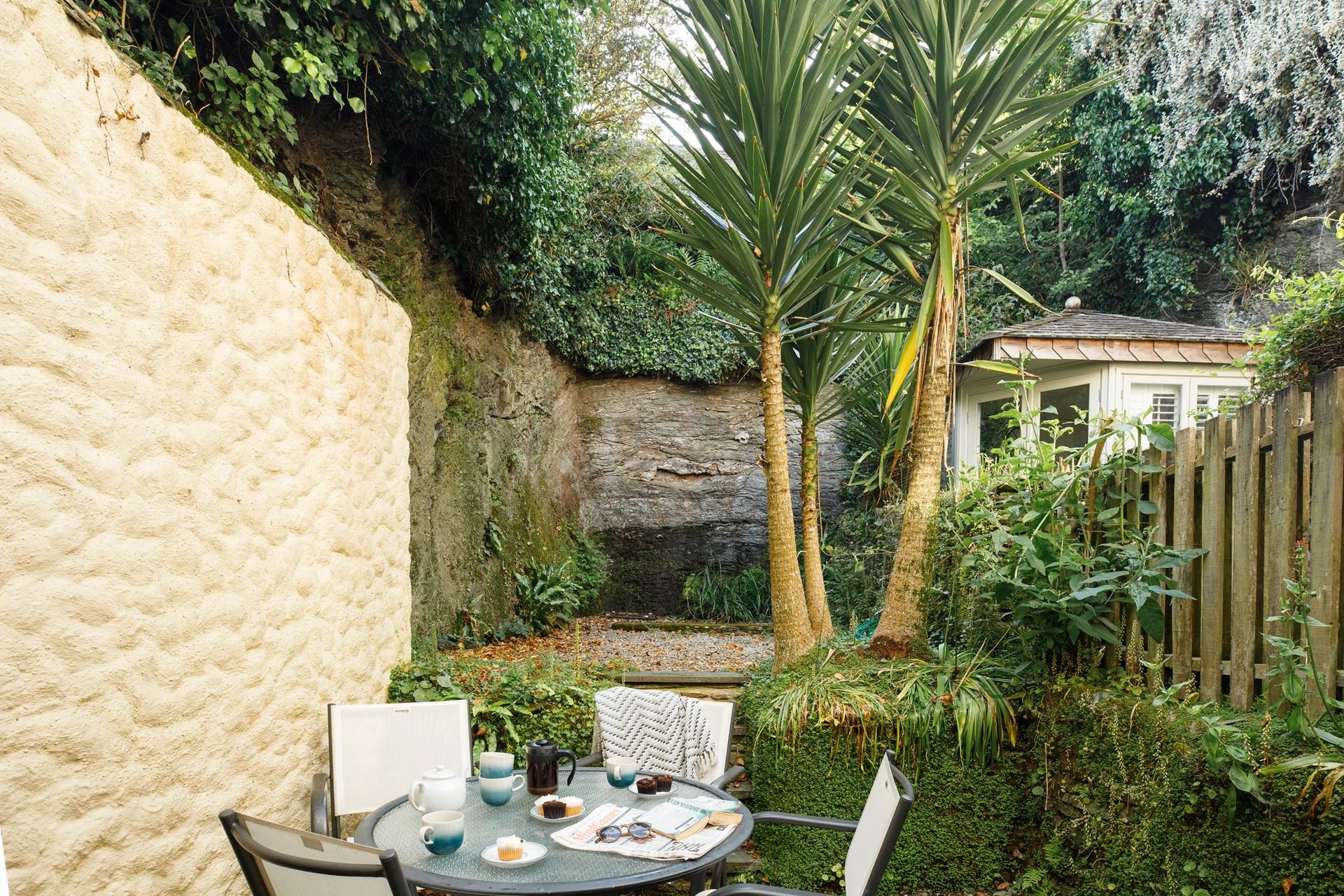 Escape to the tranquil split-level garden for an afternoon cuppa.