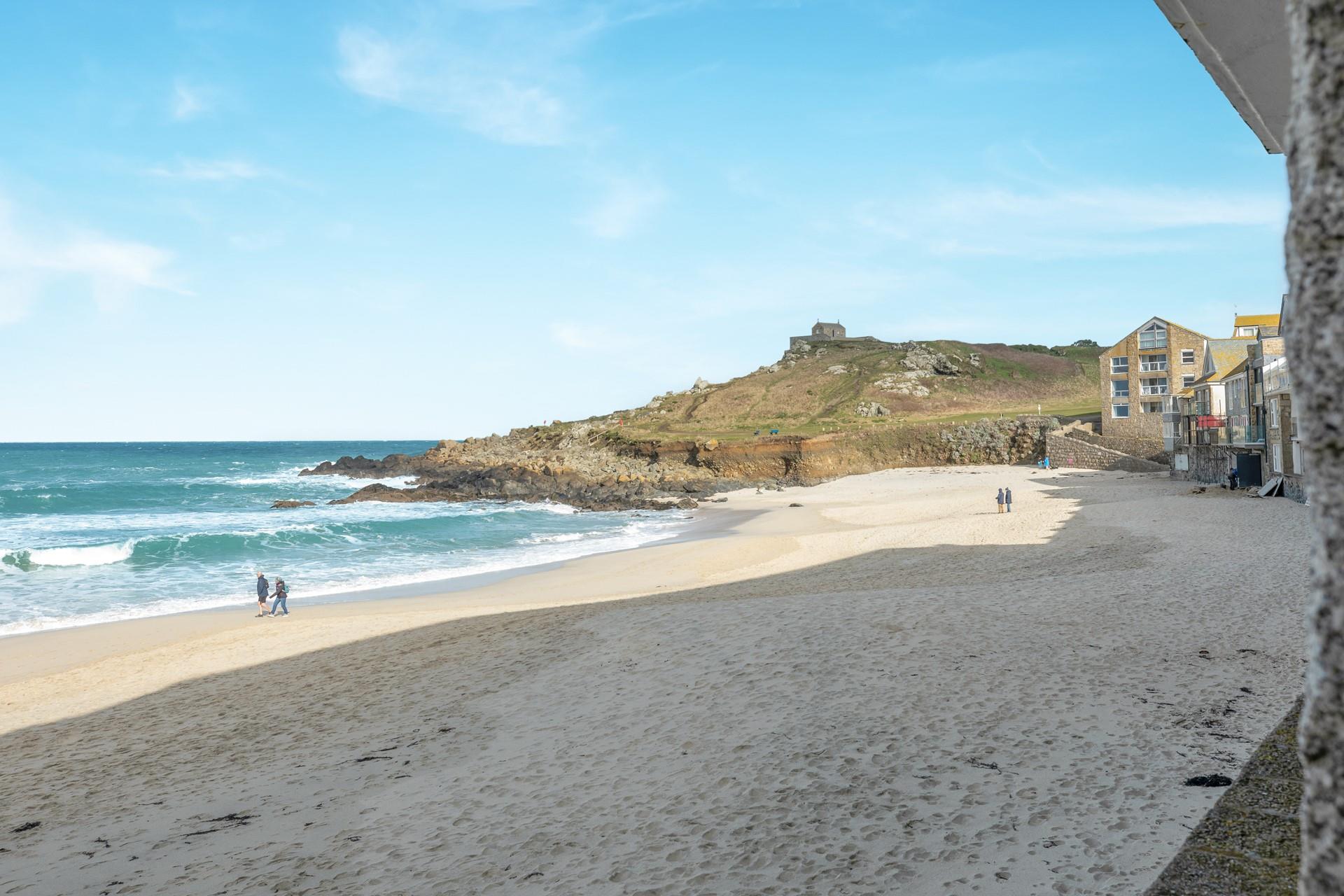 Take a morning stroll along the beach.
