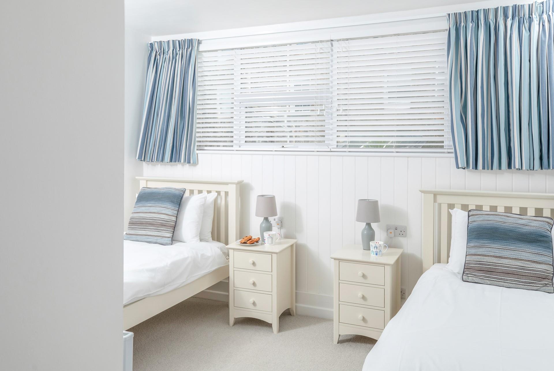 Bedroom 2 has twin beds for kids or additional adults.