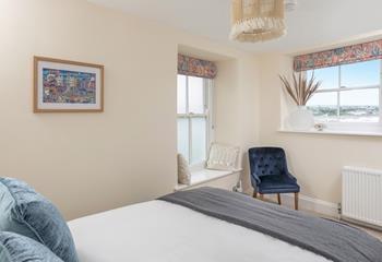 Bedroom 3 is decorated with coastal colours.