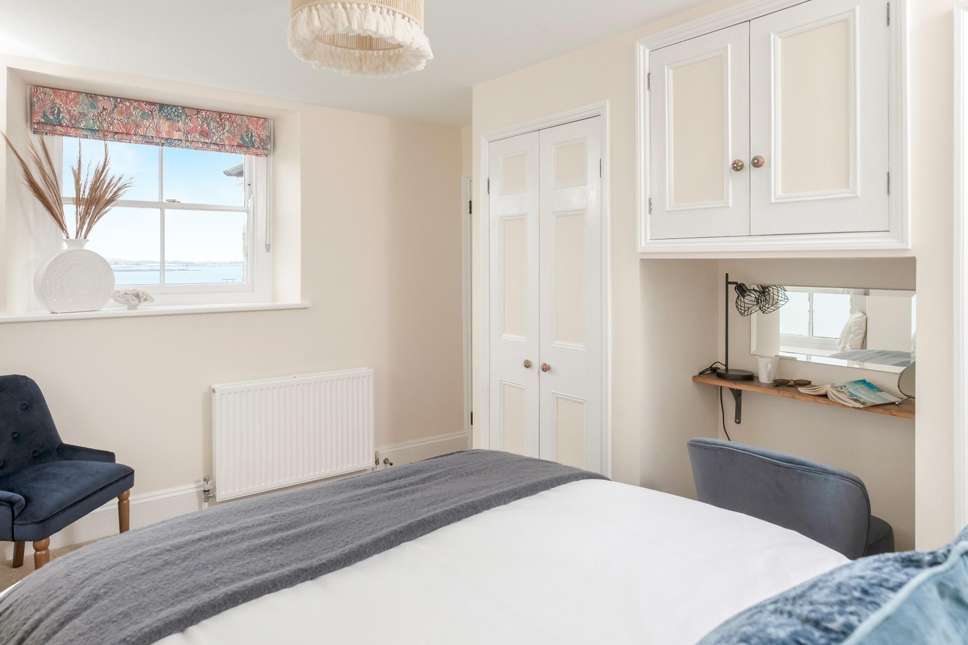 Wake up to beautiful sea views in the bedroom.