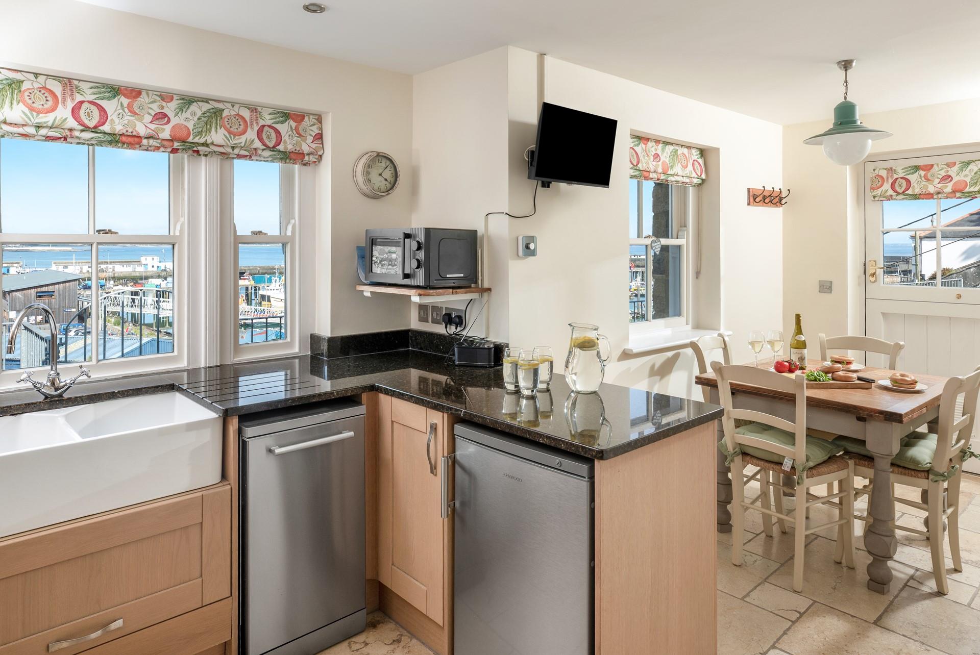 Prepare a hearty meal with a view of Newlyn's boats.