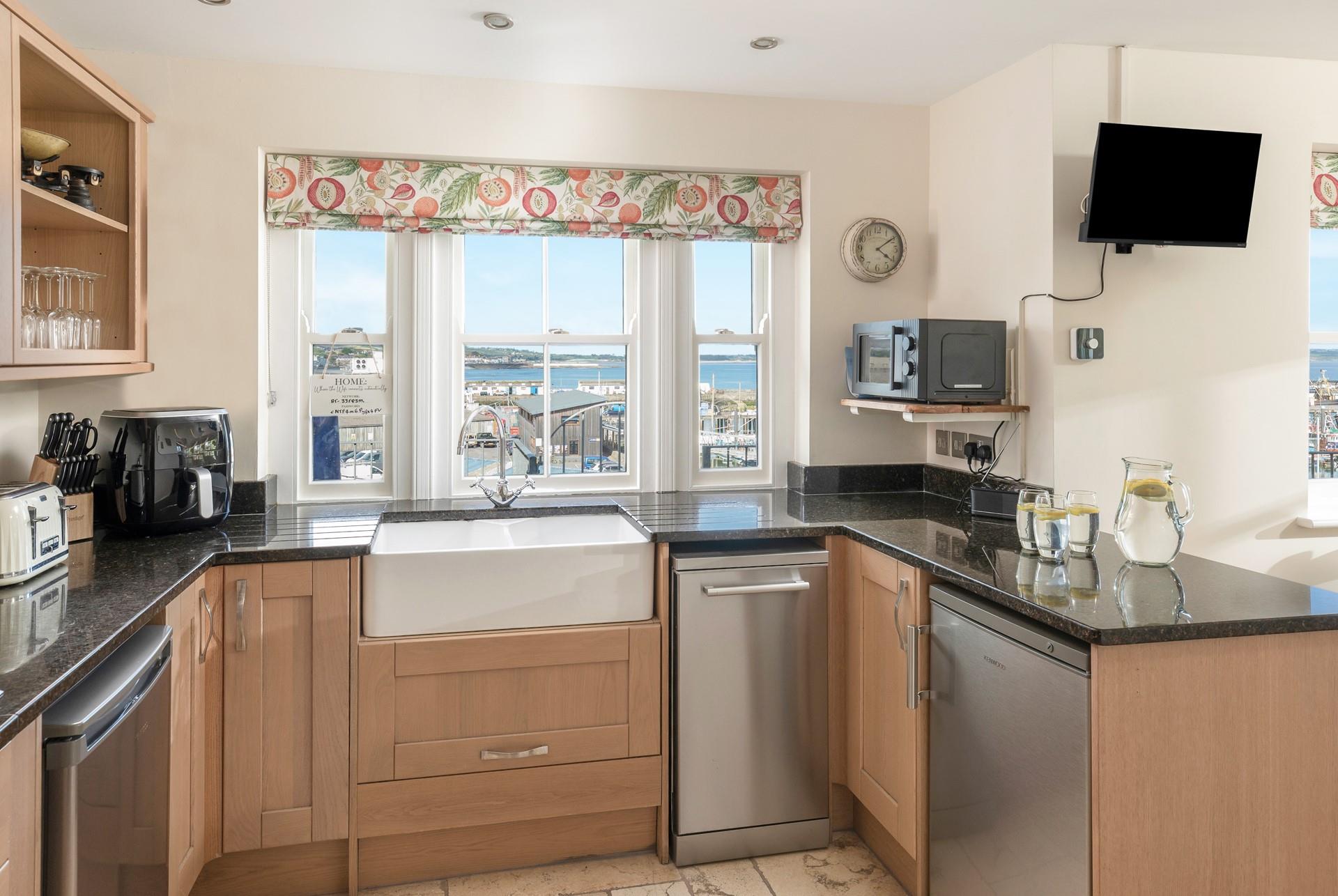 The kitchen has perfect views of the harbour.
