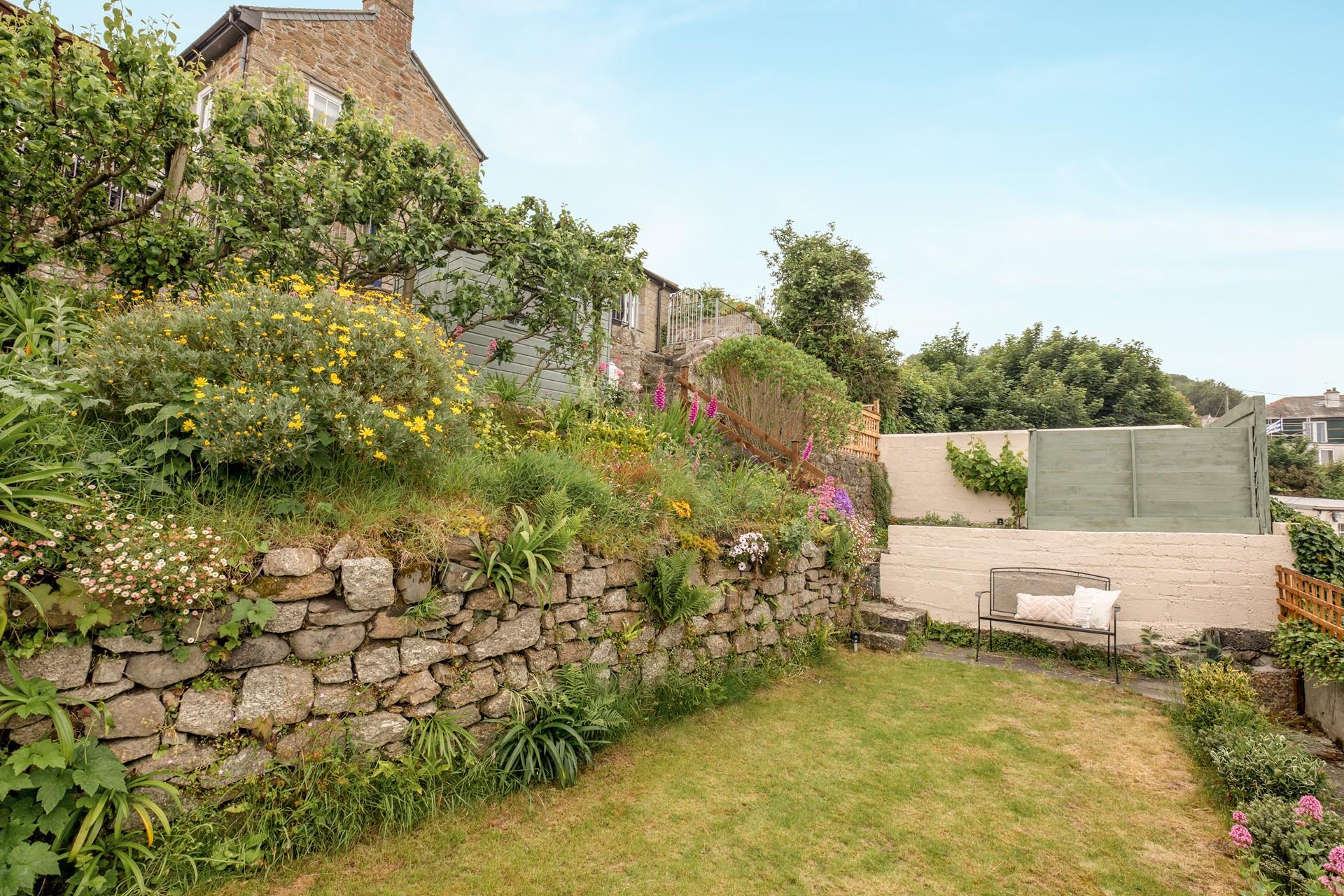 The garden offers a peaceful place to relax at the end of the day. 