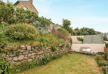 The garden offers a peaceful place to relax at the end of the day. 