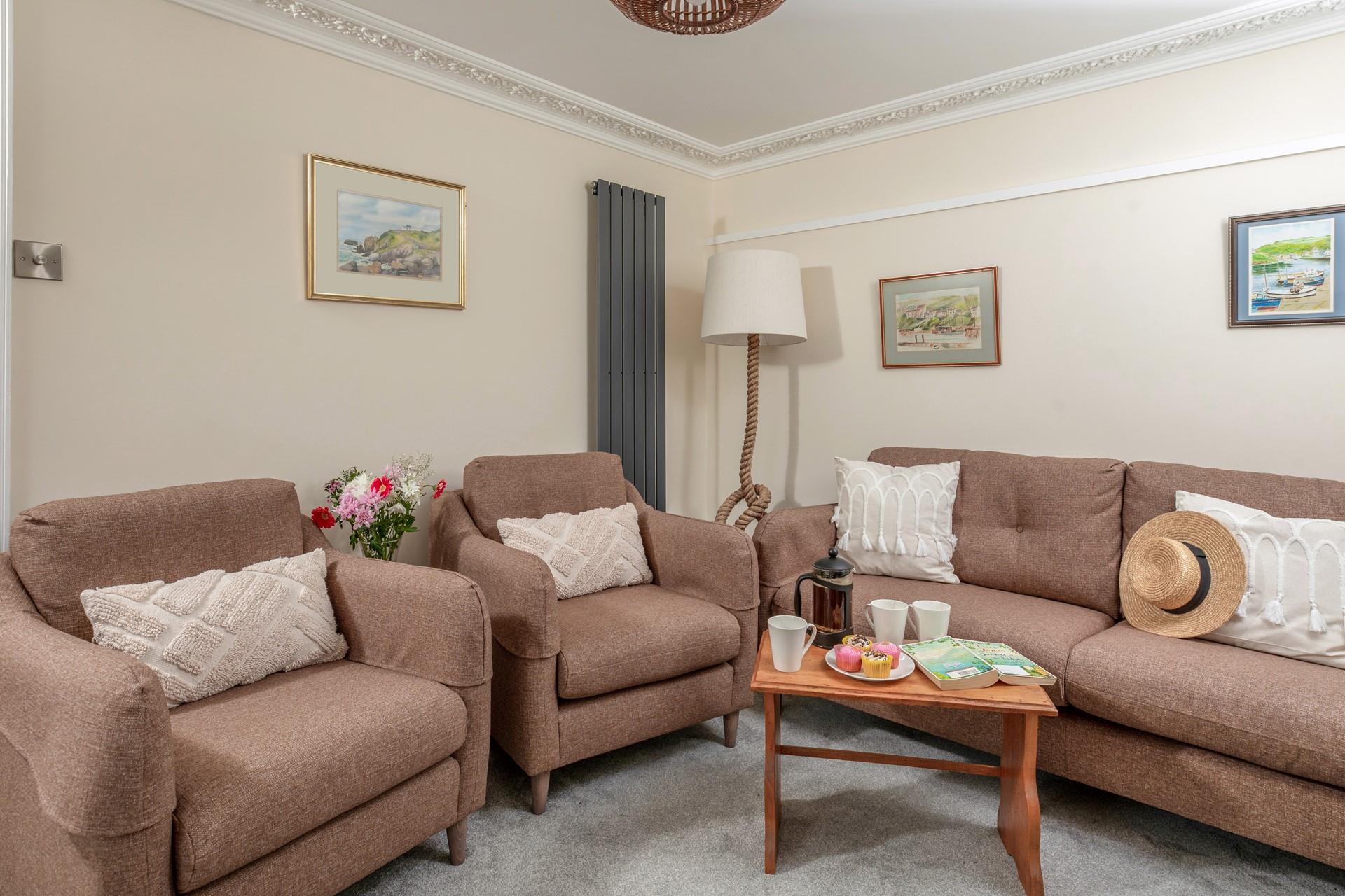 Sit back and relax in the cosy sitting room.