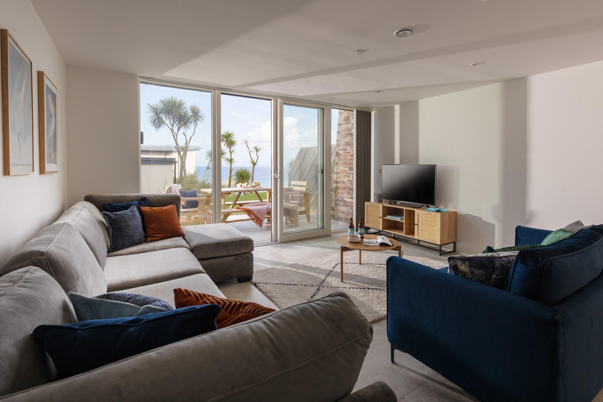 Light and spacious, there a multiple living areas, all with sea views!