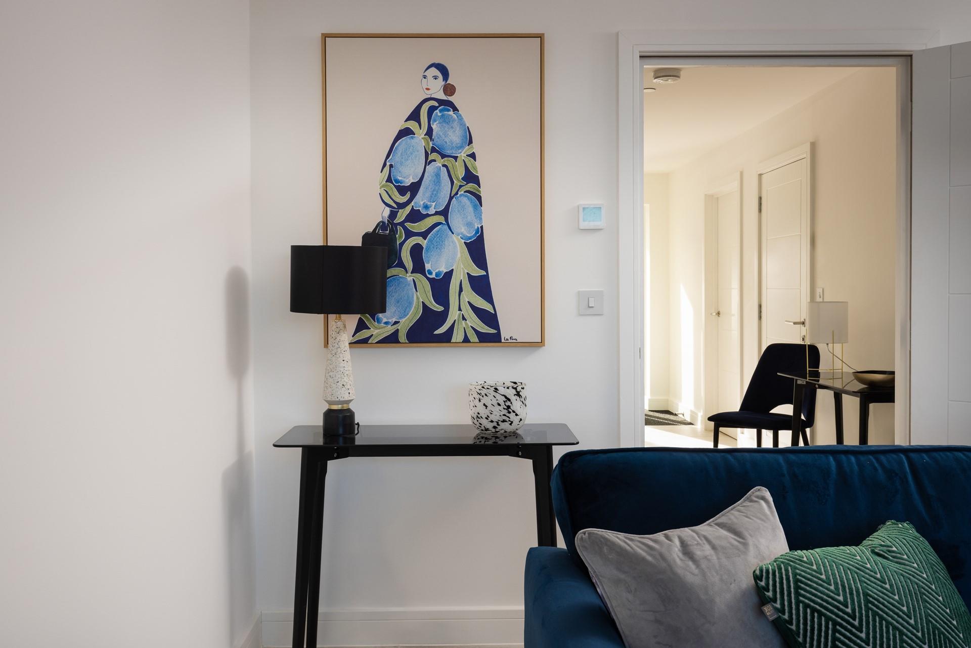 Bright and stylish artwork adorns the modern townhouse.