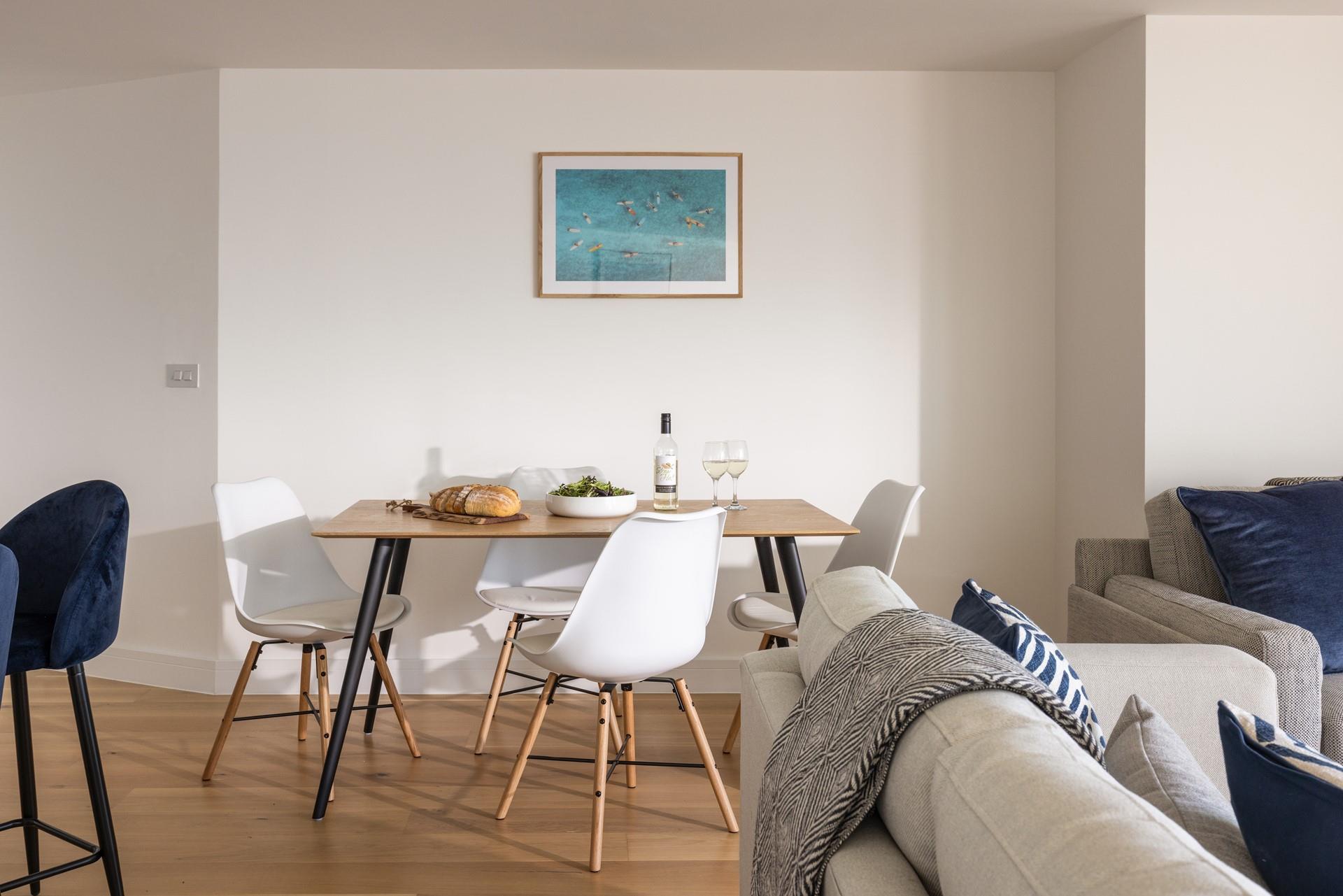 Tuck into your favourite meal around the dining table with a view. 