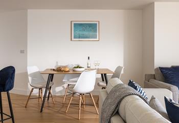 Tuck into your favourite meal around the dining table with a view. 
