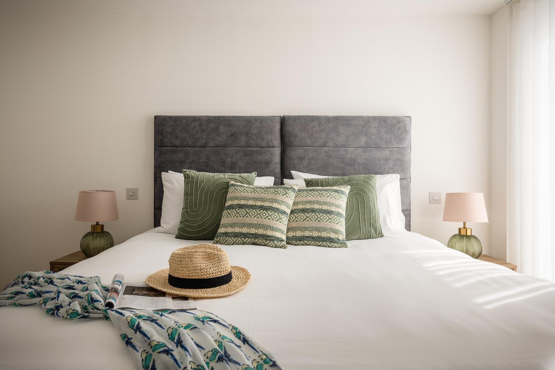 Sink into bed and drift off to sleep in bedroom 2.