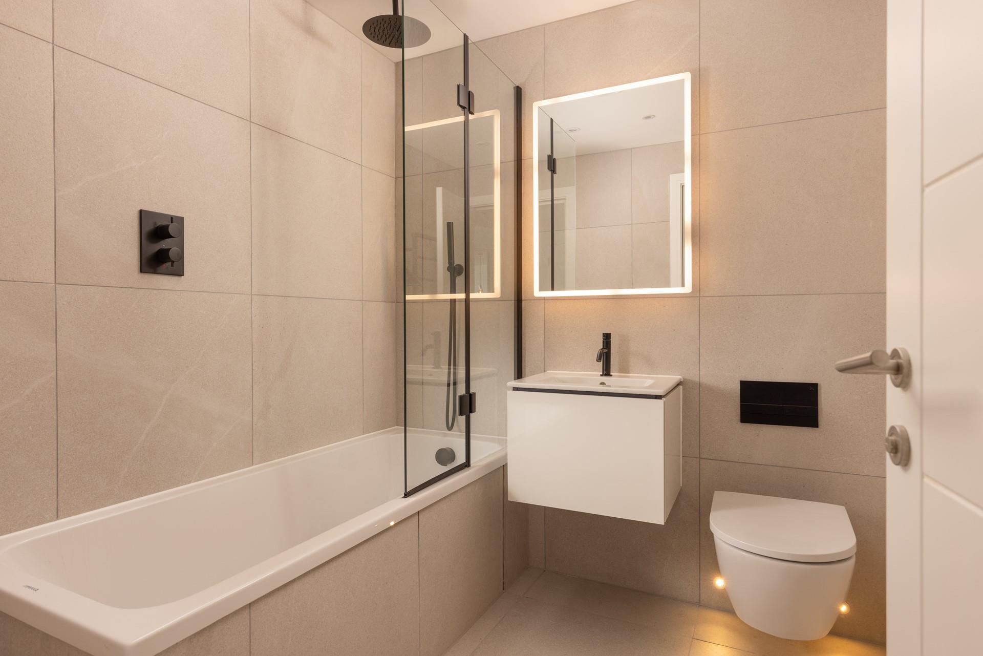 After walking the coast path, unwind with a relaxing soak in the bath.
