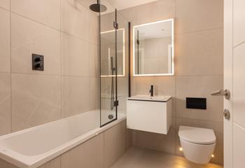 After walking the coast path, unwind with a relaxing soak in the bath.