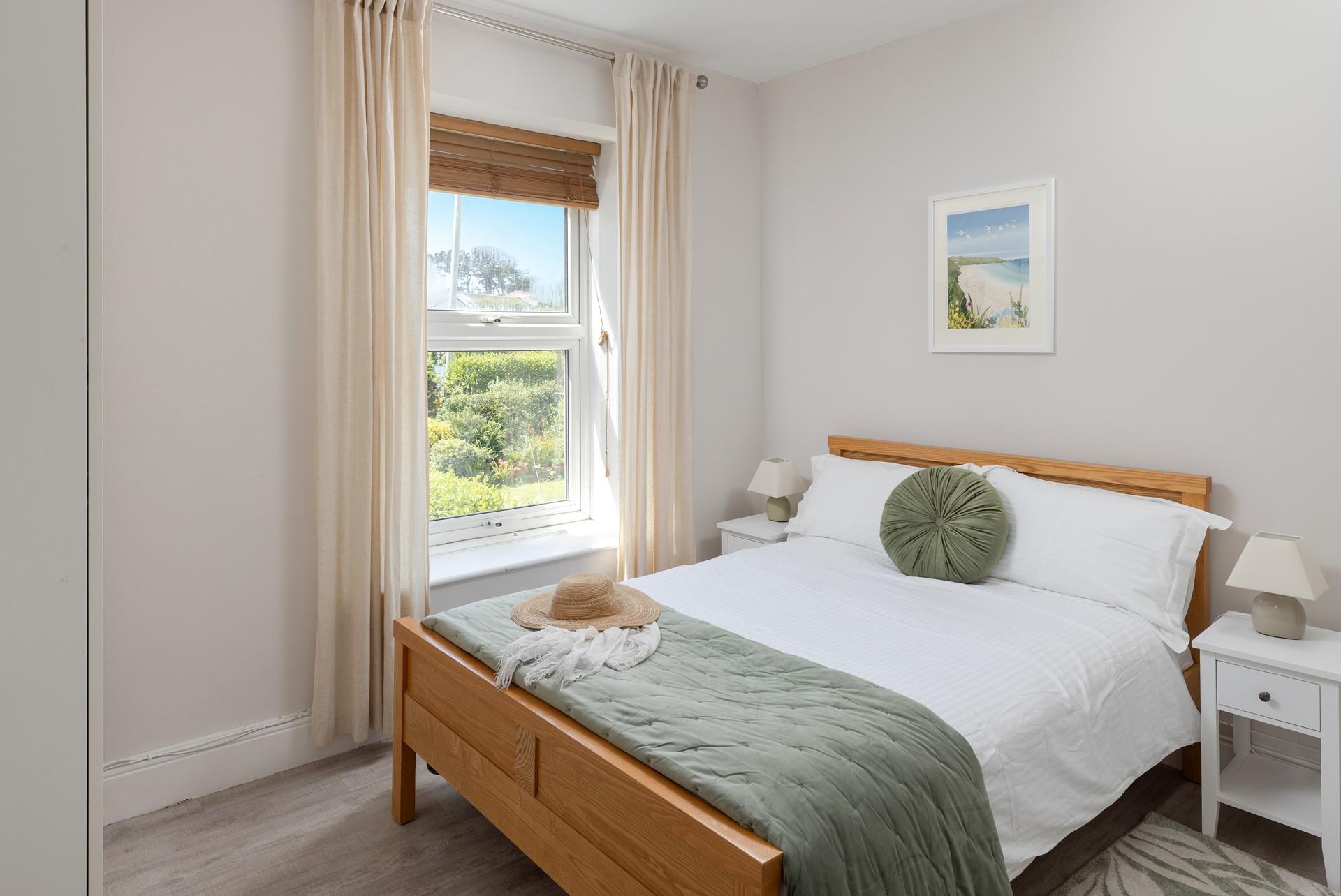 The double bed offers a restful night's sleep.