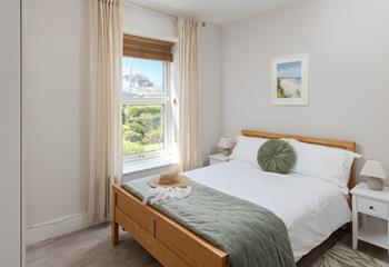 The double bed offers a restful night's sleep.