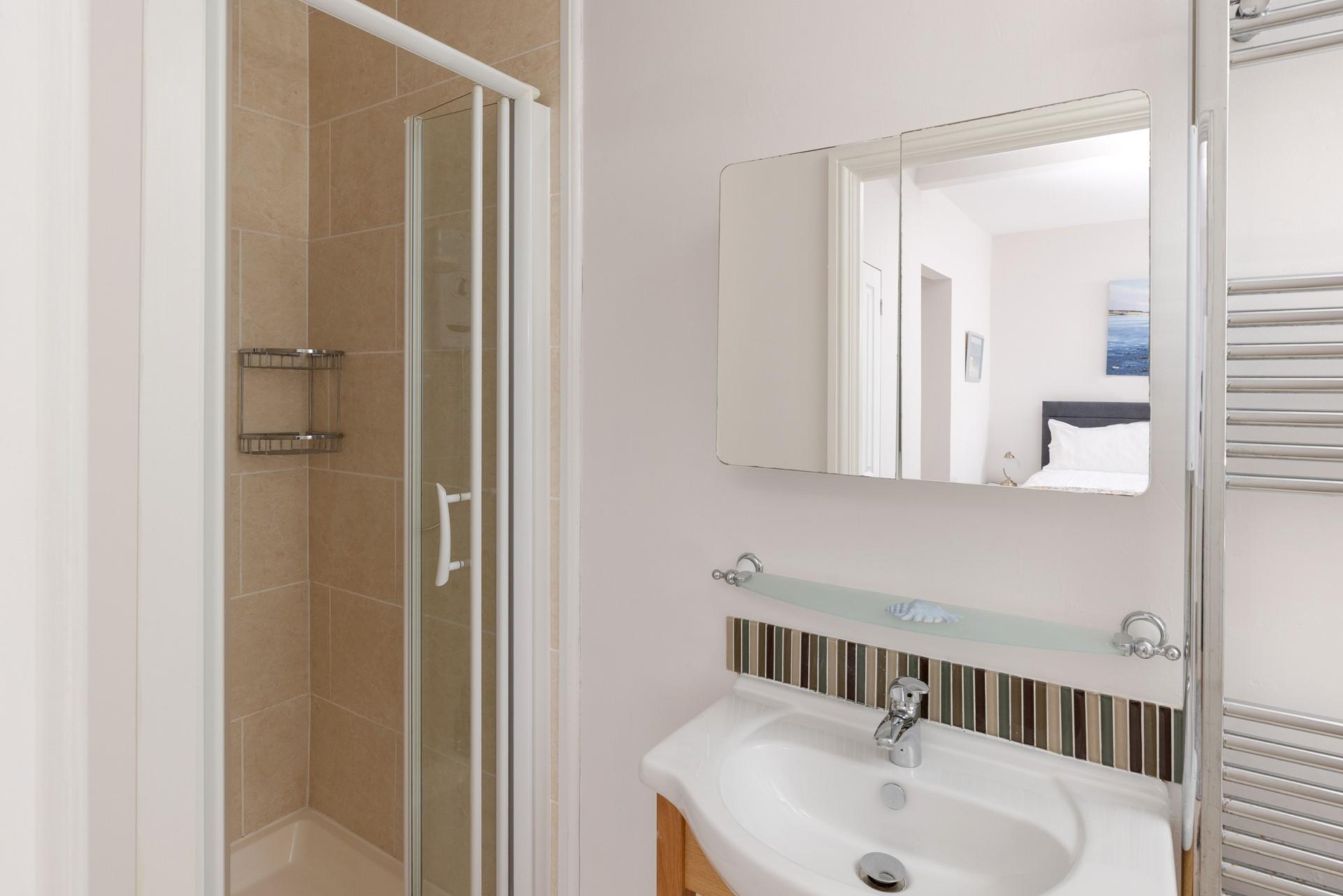 The en suite is ideal for getting ready each morning.