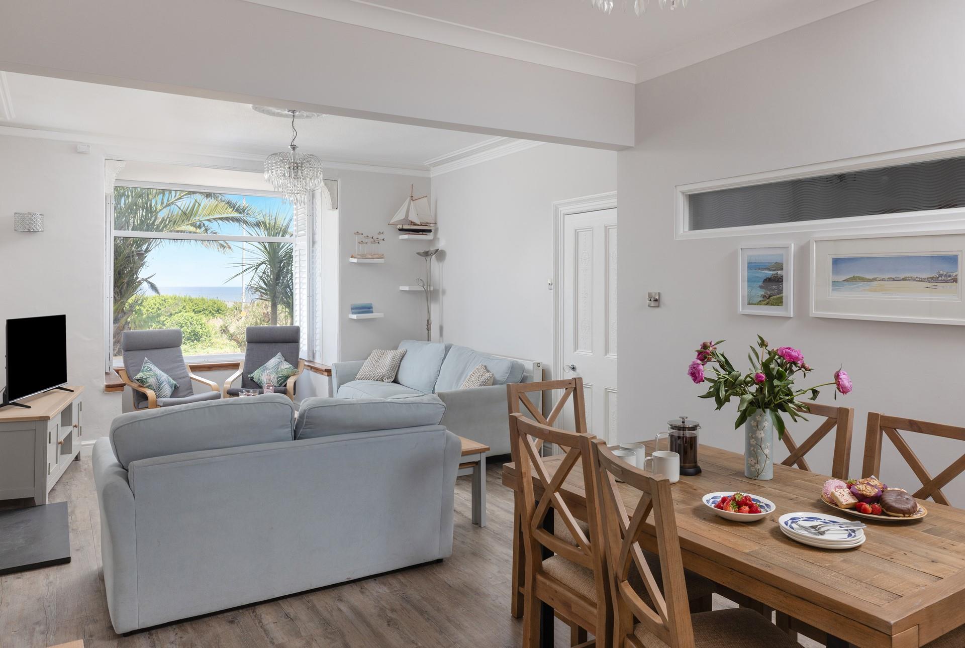 An open plan sitting and dining area is ideal for large family groups.