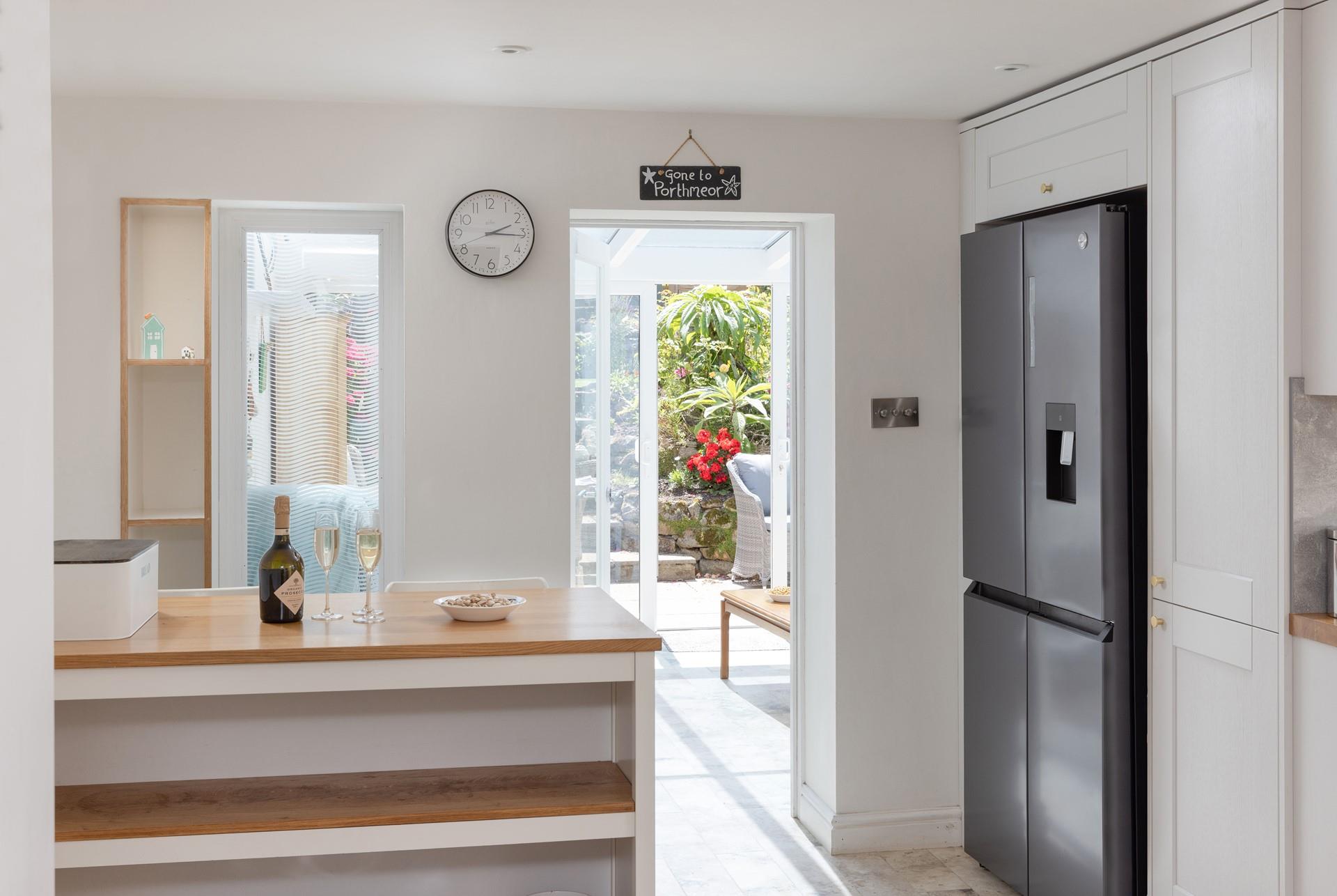 Take a glass of bubbles out to the garden.