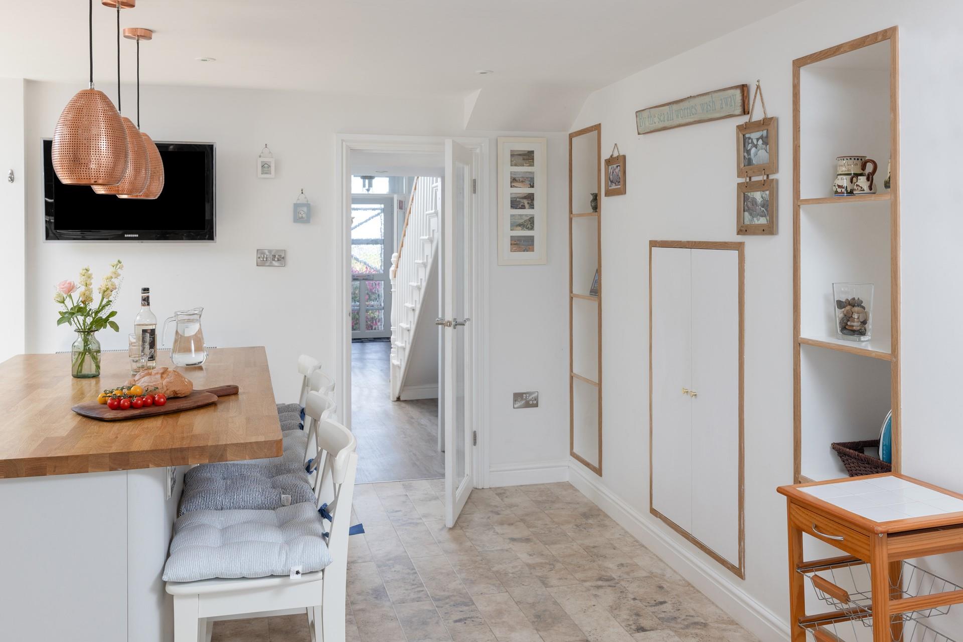 Step into the large and bright kitchen.