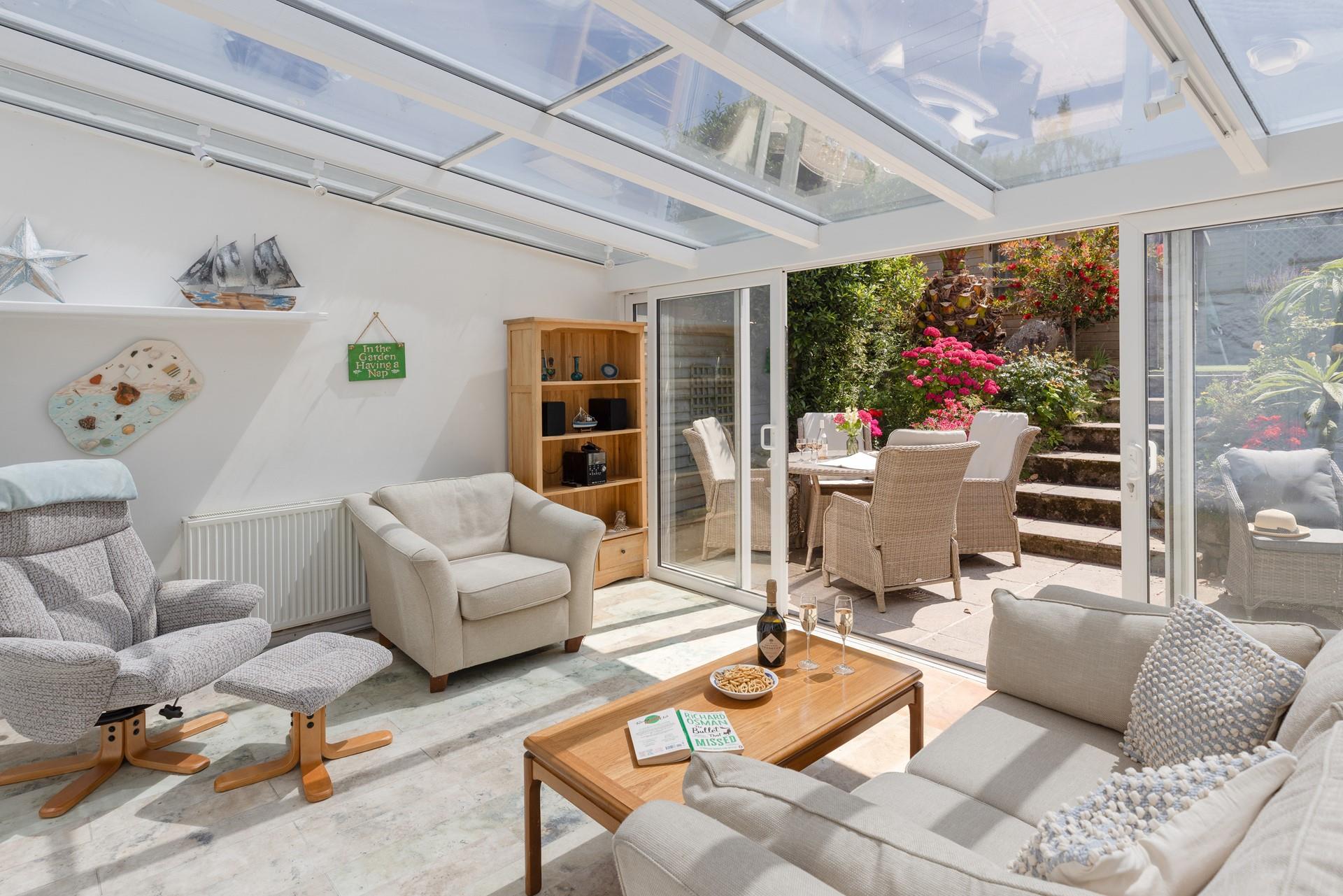 Slide open the conservatory doors and let the summer breeze in.