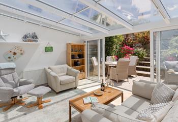 Slide open the conservatory doors and let the summer breeze in.