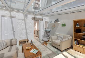 The conservatory is an additional space to unwind.
