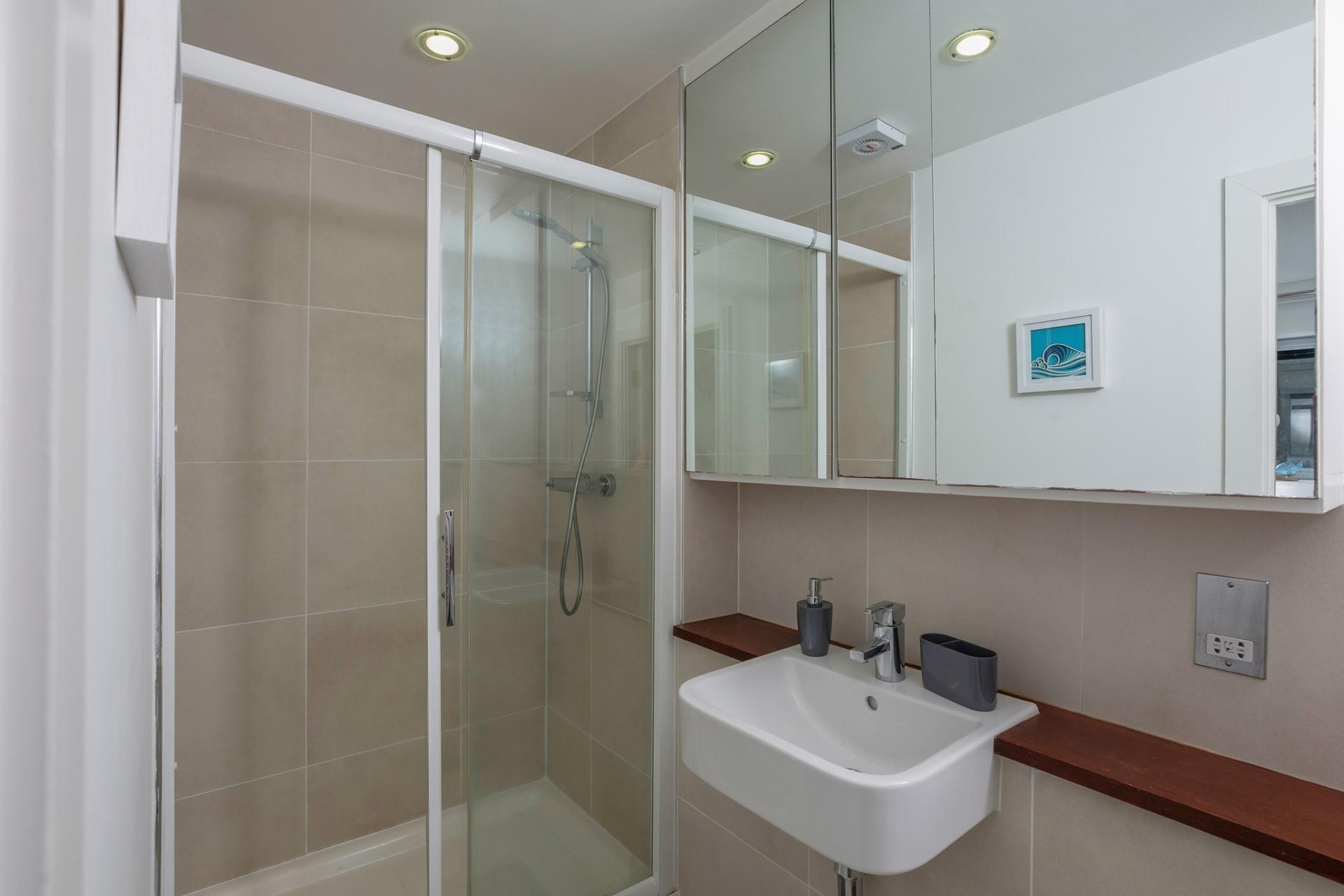 Wash off sandy toes in the shower.