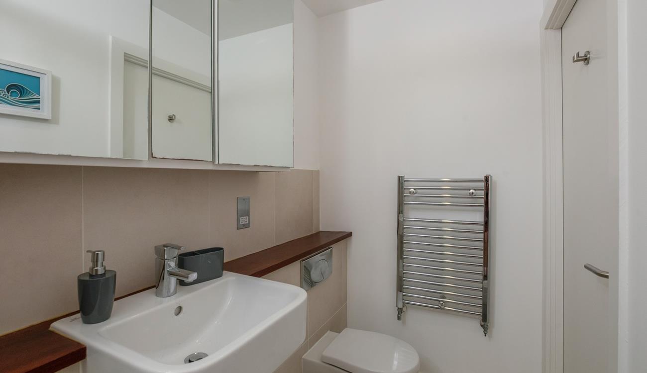 Get ready for the day in the en suite shower room.