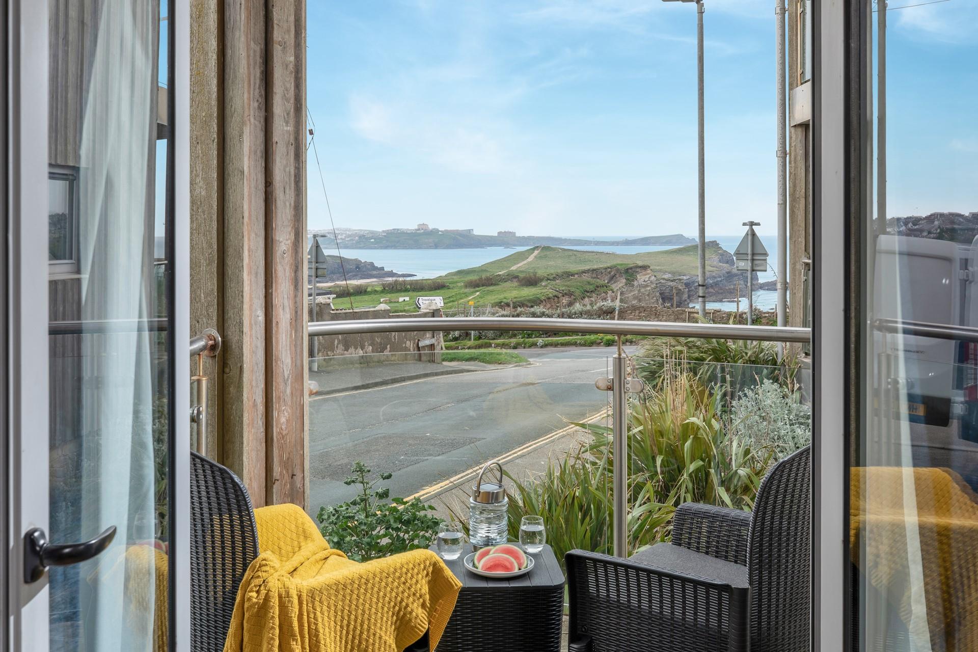 Gaze out over the headland from the balcony.