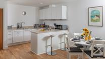 The kitchen is fully equipped for cooking tasty meals.