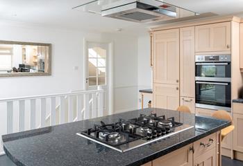 There is ample space for the family to cook and dine together.