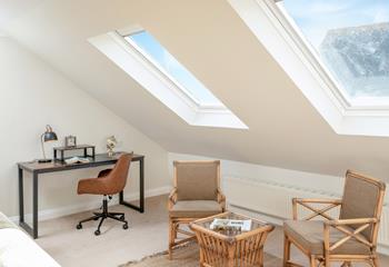 Get stuck into a good book or check some emails at the desk area.
