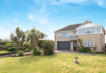 The large front garden offers the perfect space for kids to play.