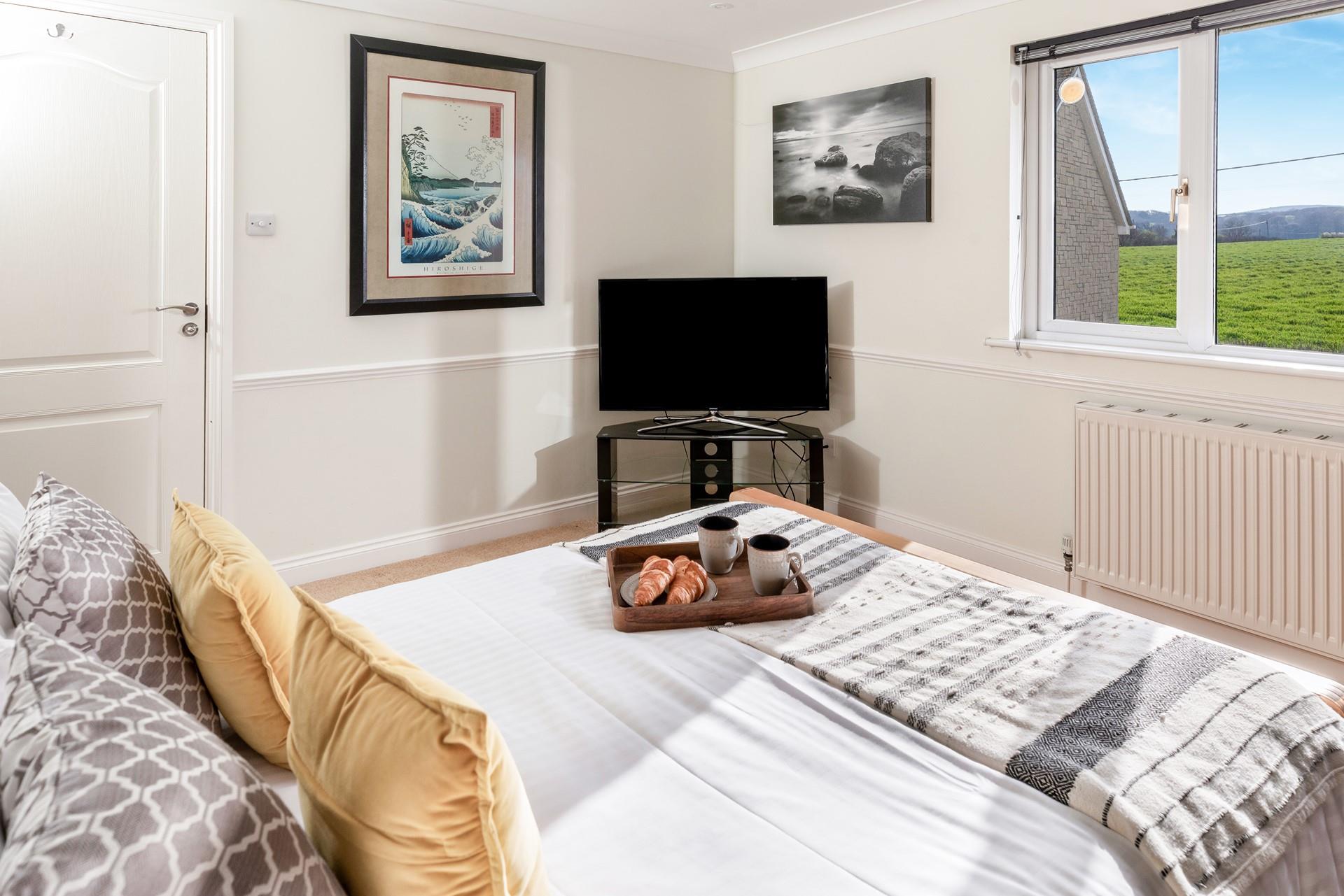 Unwind after a day's adventure in the cosy bedroom.