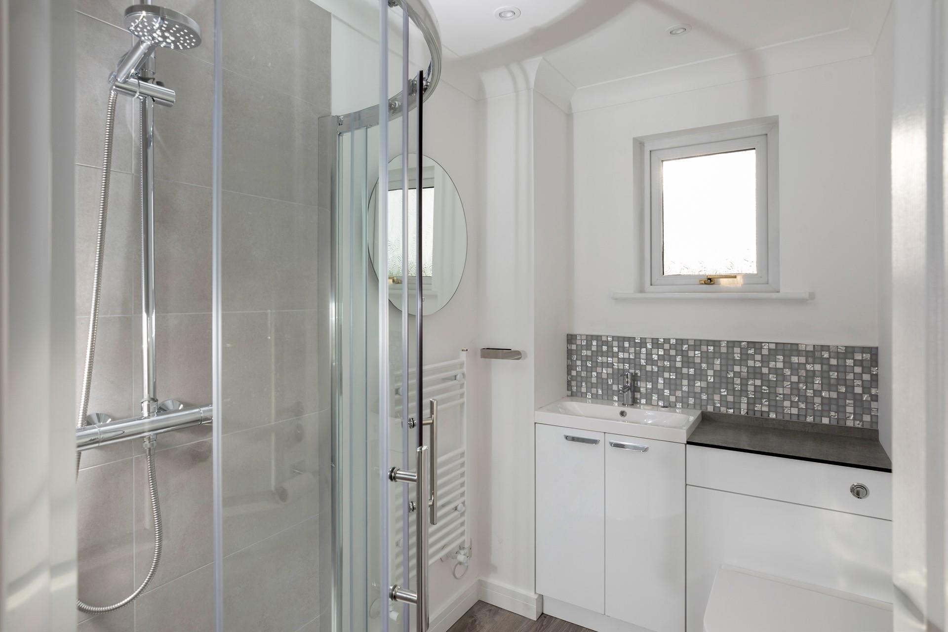 Wash off sandy toes in the shower room upstairs.