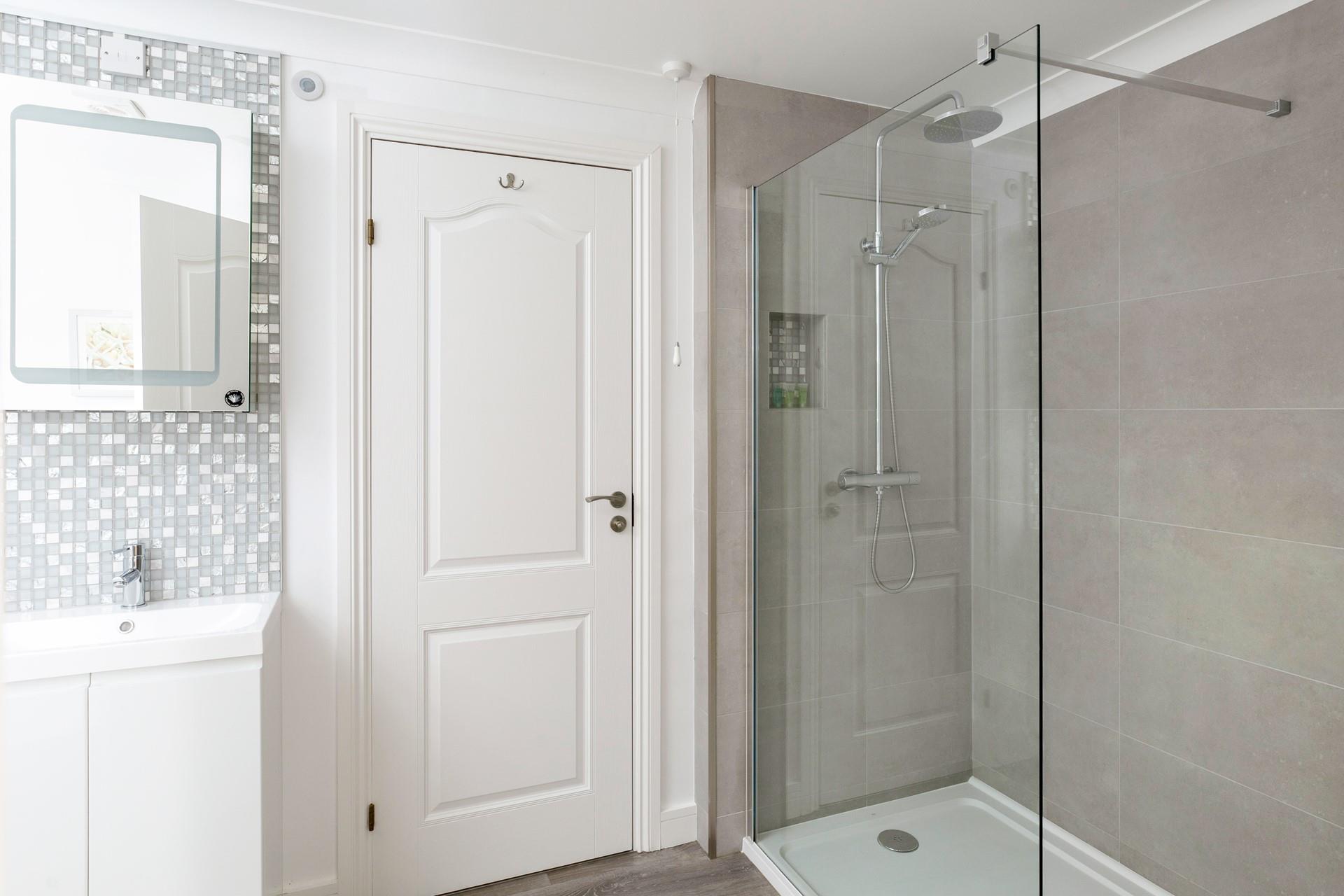 The modern en suite is the perfect space to get ready for evening out.
