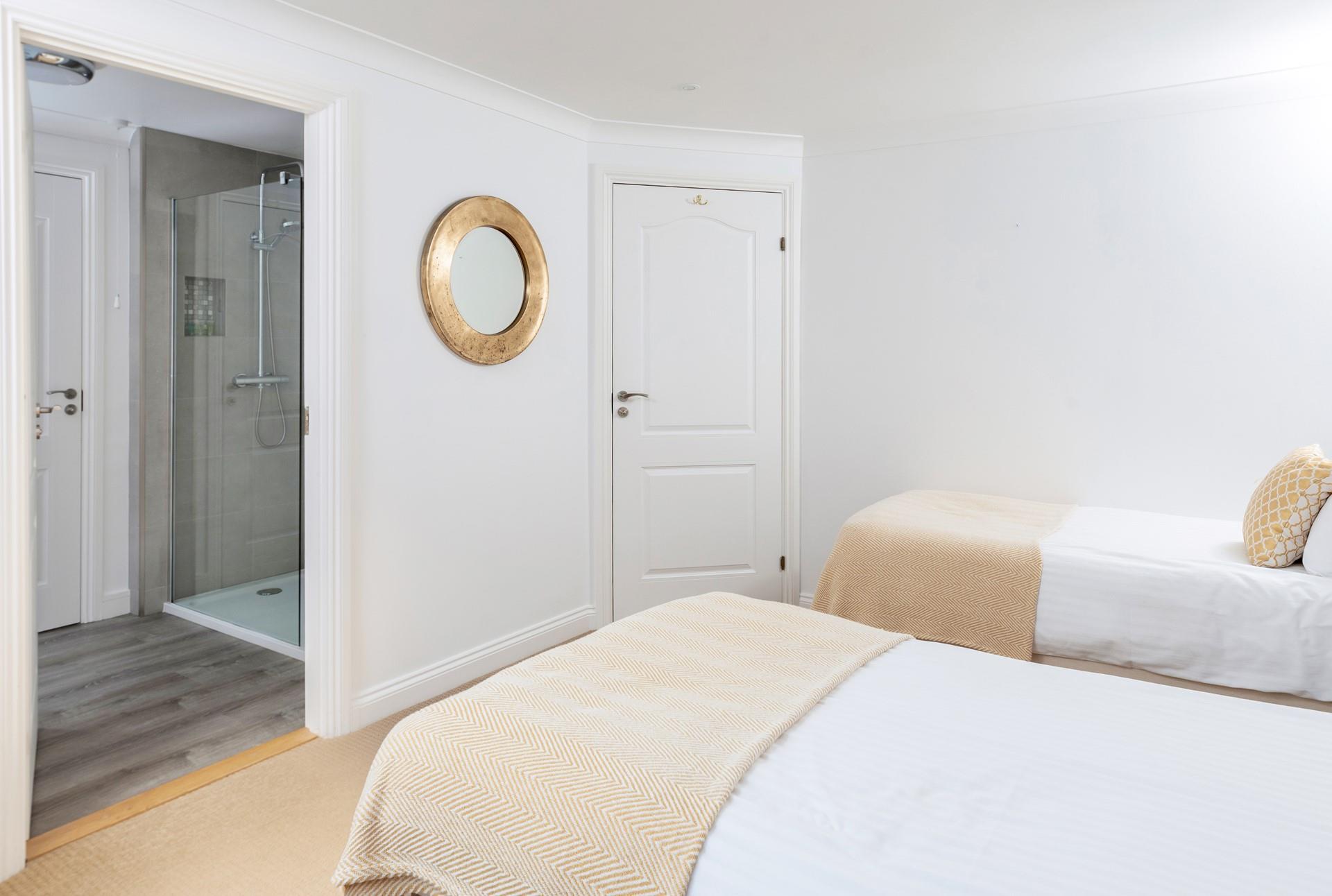 The twin room has a handy en suite shower room.