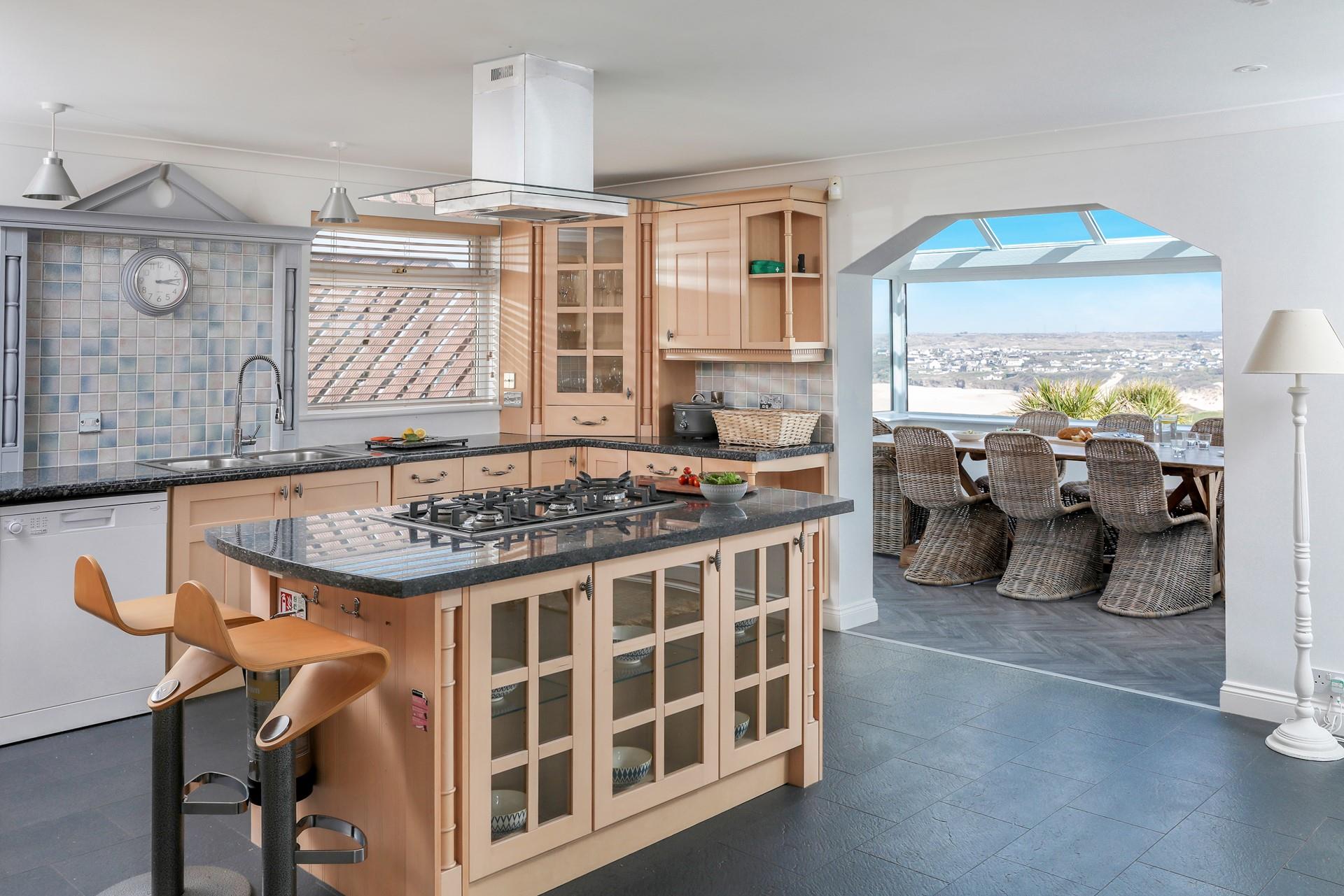 The large kitchen is fully equipped.