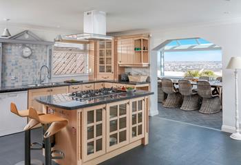 The large kitchen is fully equipped.