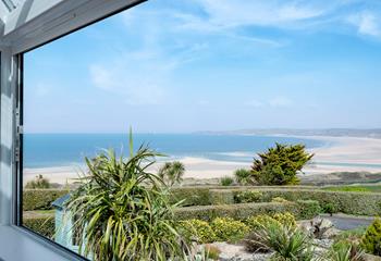 If you can tear yourself away from these views, head out to explore the beach below.