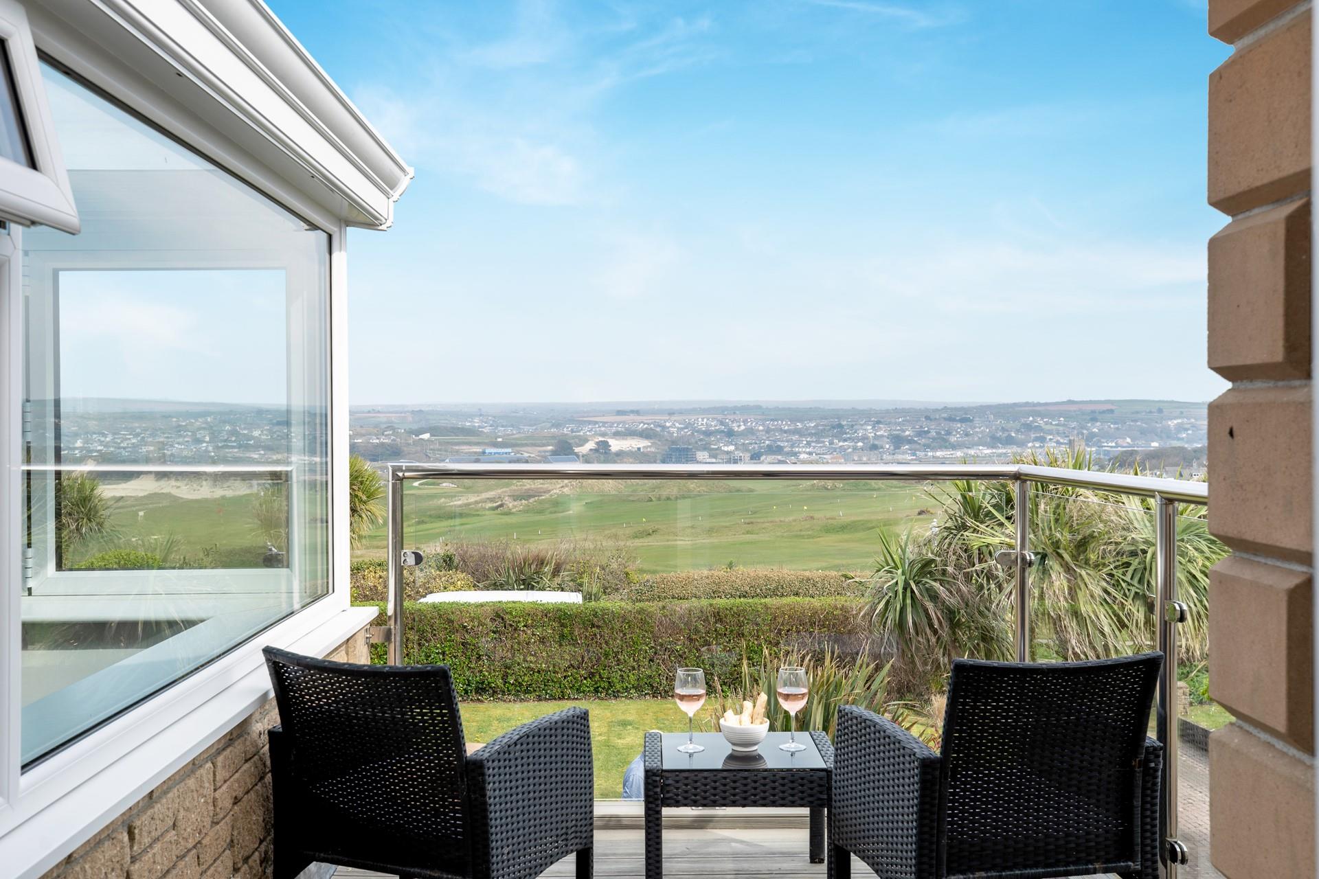 Relax on the balcony admiring the view.
