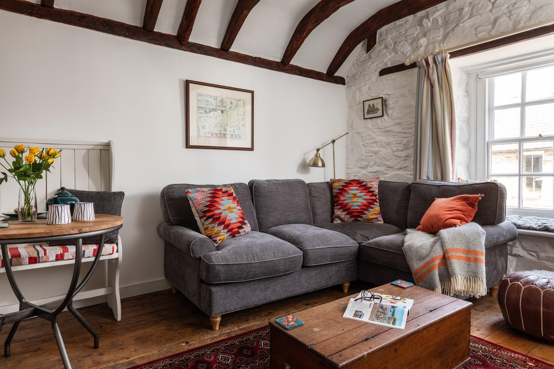 The cosy and quirky sitting room is the ideal base to relax in the evening.