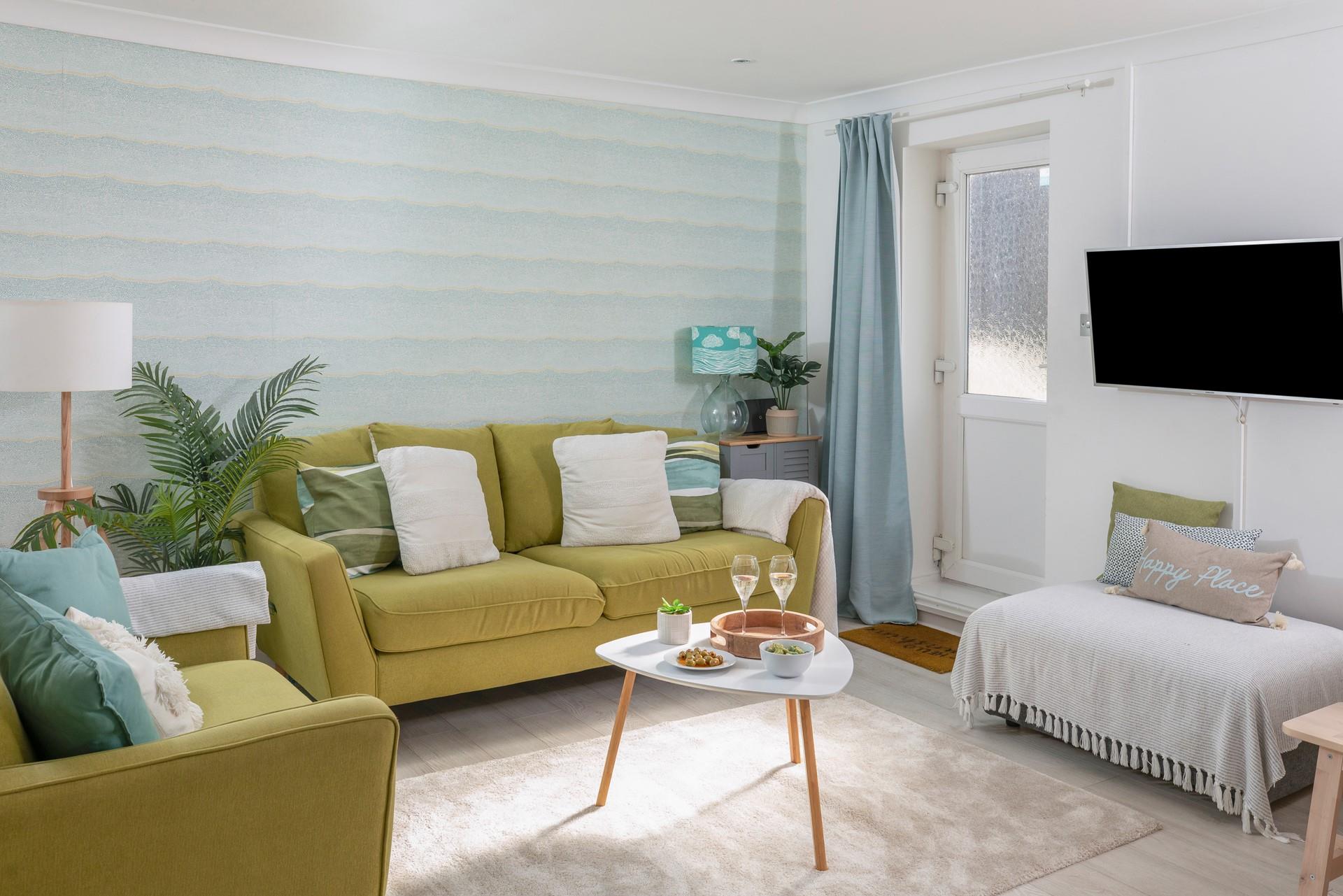 Sink into the plush sofa and unwind from a busy day.