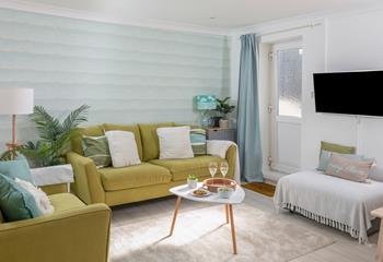 Sink into the plush sofa and unwind from a busy day.