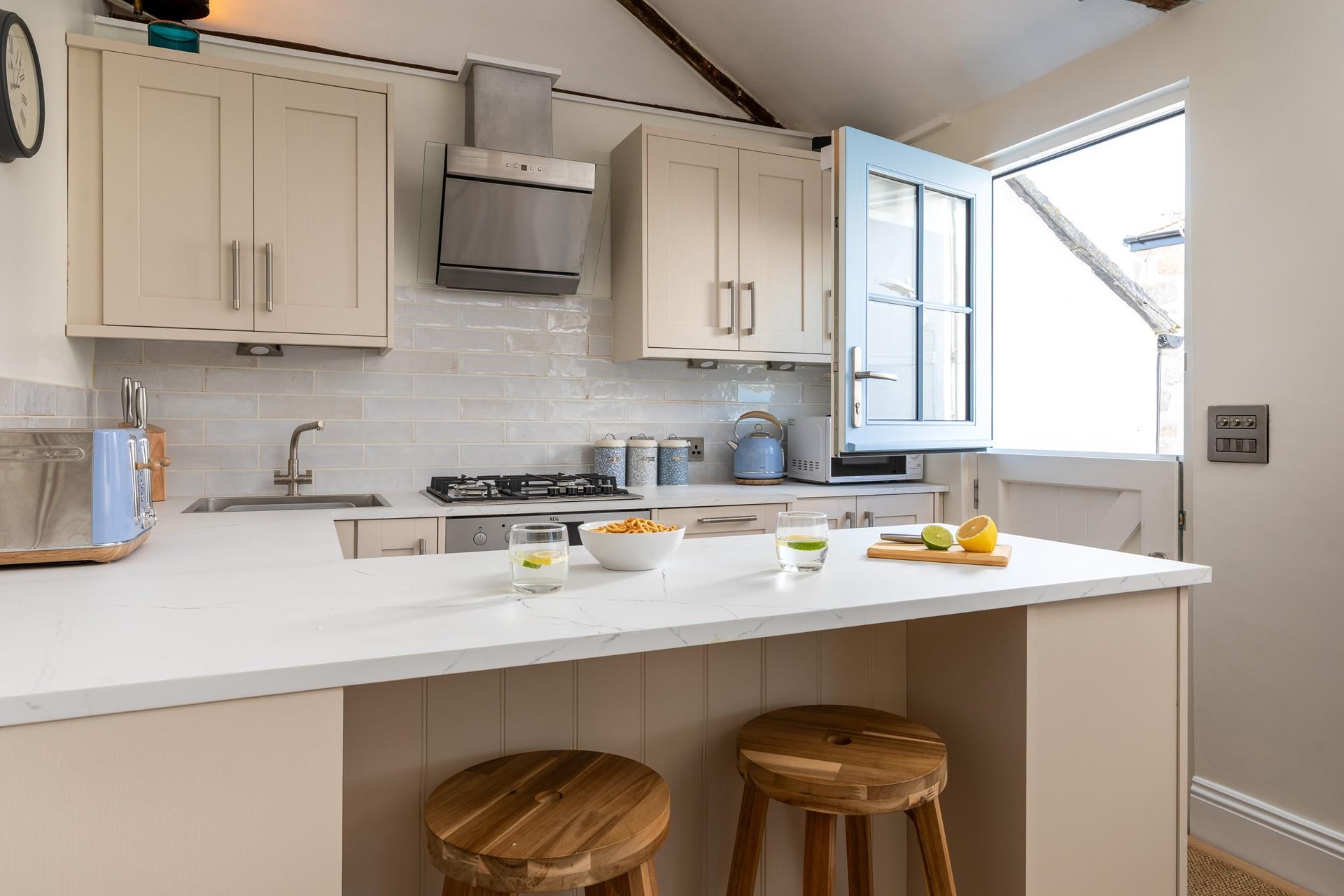 The kitchen, although compact, makes use of all the space!