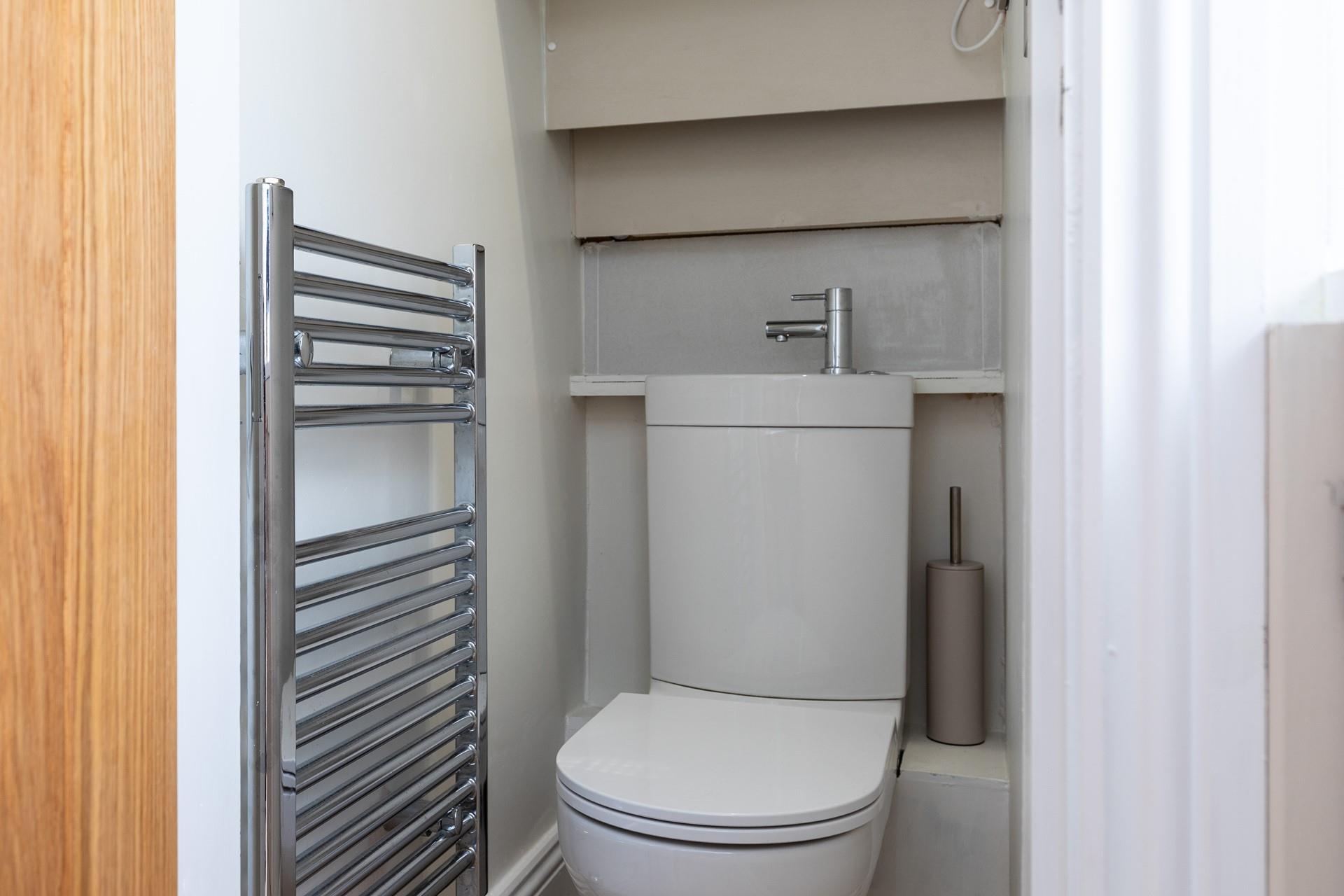 There is a handy additional toilet in the upstairs cloakroom.