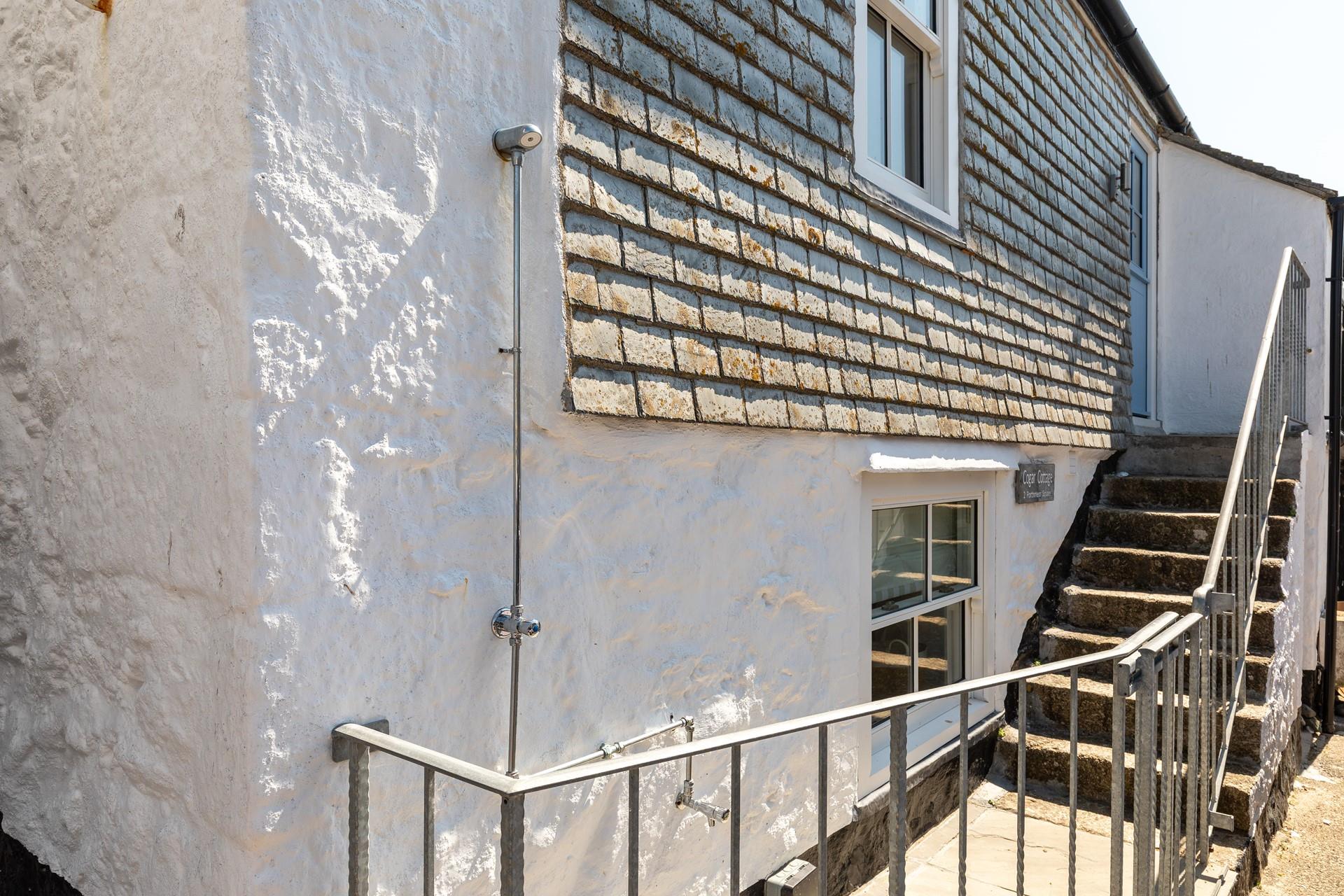 The handy outside shower is ideal for washing down wetsuits and boards!