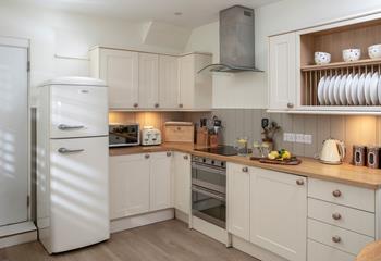 The kitchen is modern and well equipped.