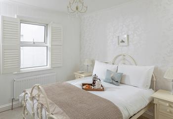 Sip coffee in bed and decide on the day's plans.
