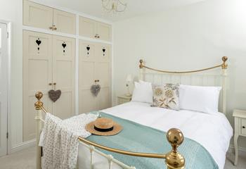 There is ample wardrobe space in the bedroom.